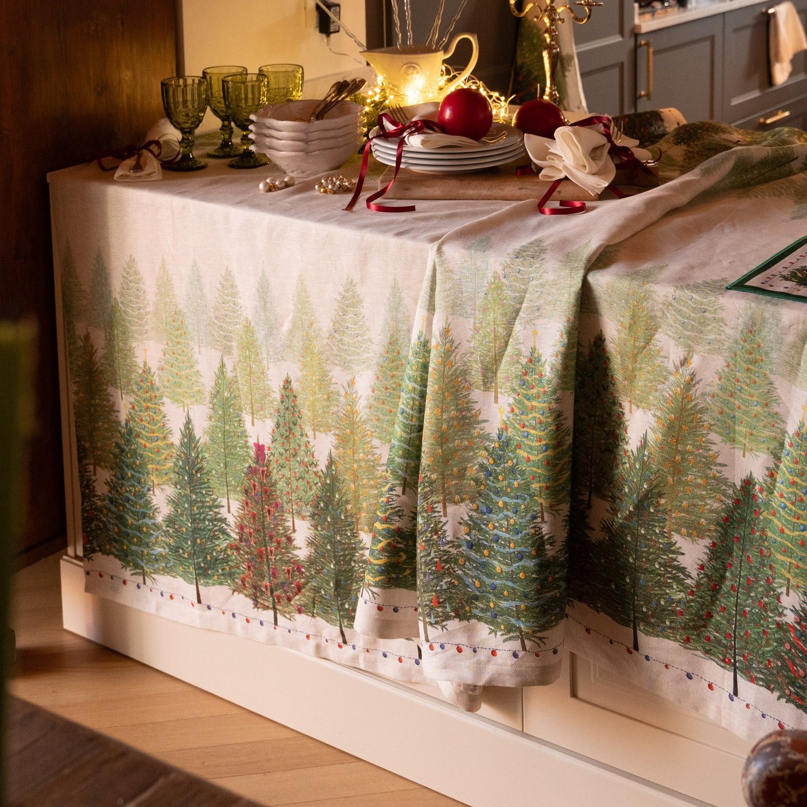 Fairy Trees printed linen Christmas tablecloth with a border of Christmas trees along both long edges