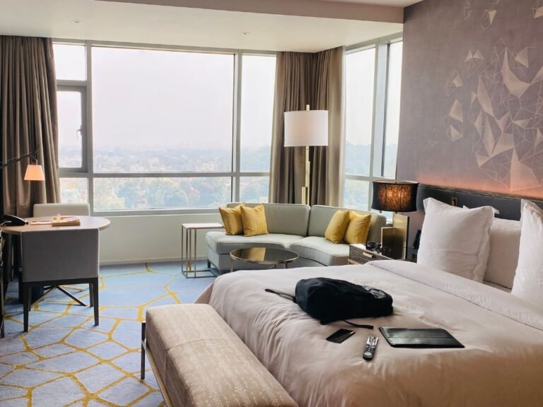 Neutral luxury bedroom with fitted sheet on bed – blog cover for custom bedding